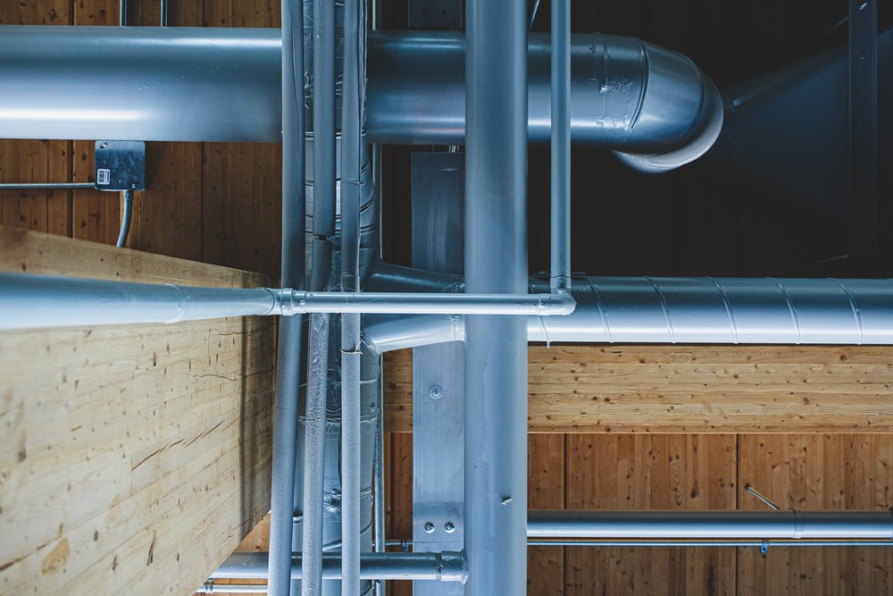 A NetworkNarrow and Large Blue Pipes from a Heating System